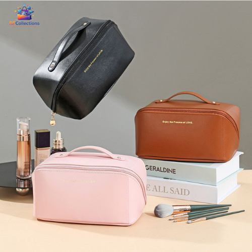 Large capacity travel makeup and cosmetic storage bag with compartments, waterproof PU leather design and portable handle for beauty essentials storage.